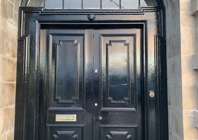 Carnegie Apartments Door with new paint finish