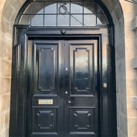 Carnegie Apartments Door with new paint finish