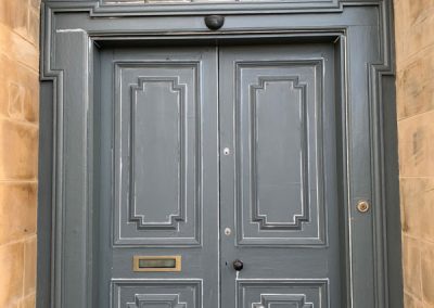 Carnegie Apartments Door before new paint finish