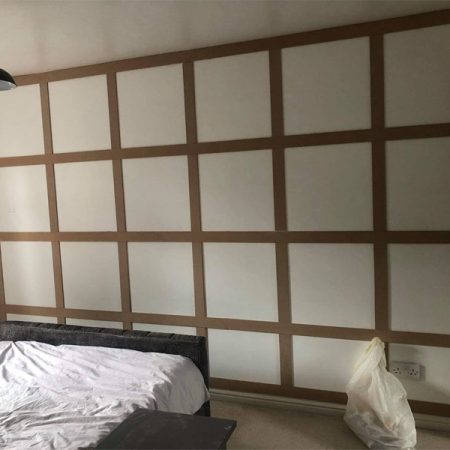 signature decorating working on a feature wall in inverkeithing