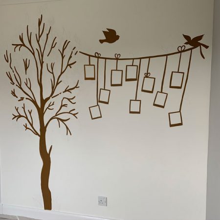 during the hand painting of saline mural by ayla at sigdecor
